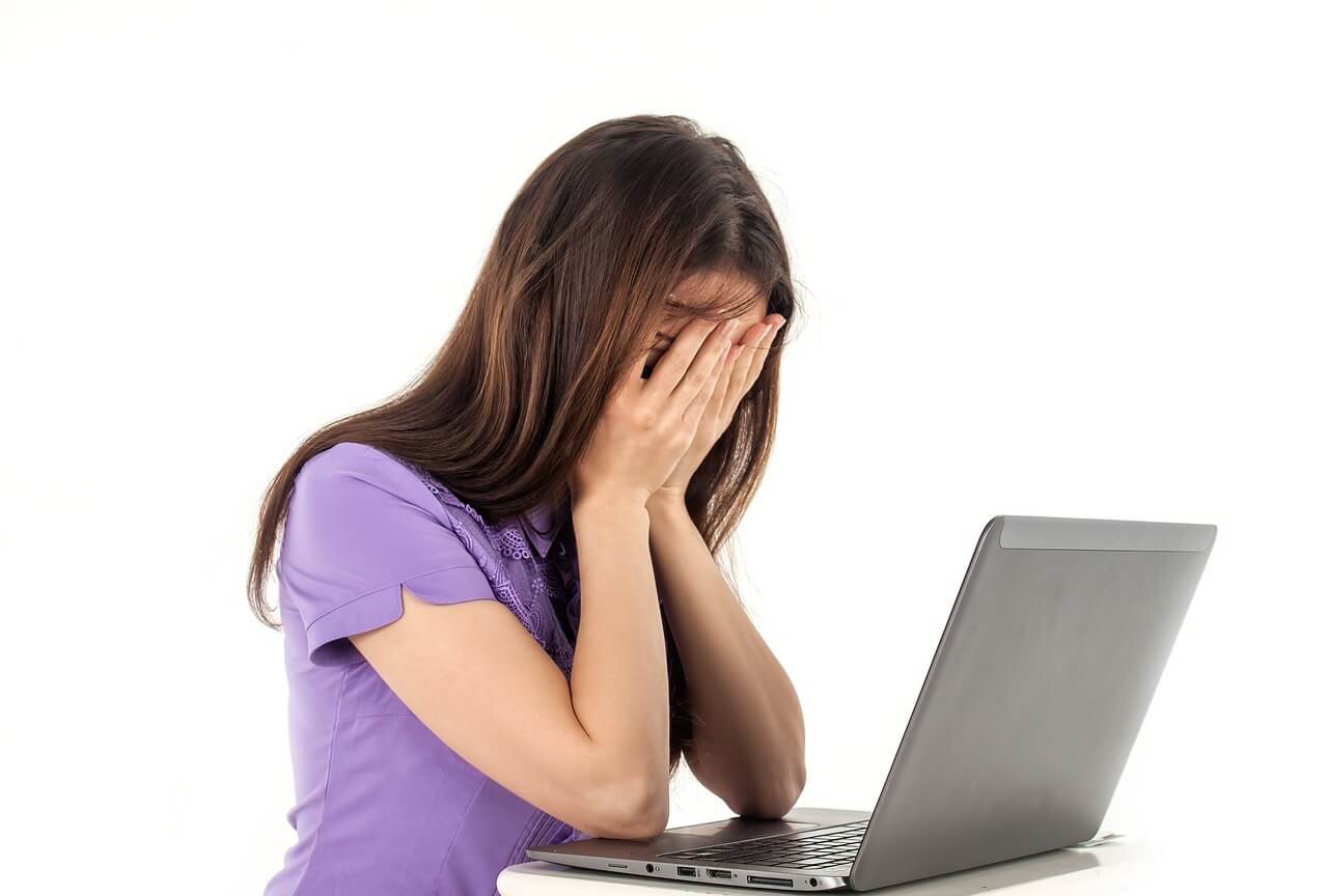 frustrated woman using computer