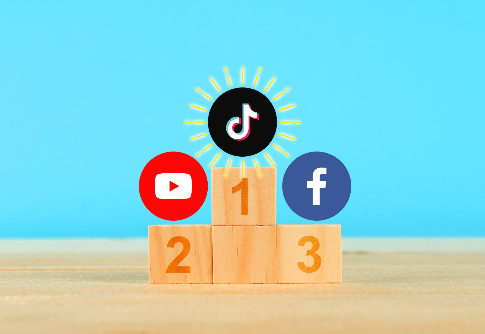 podium made of blocks showing TikTok in first place, Youtube in second place, Facebook in third place